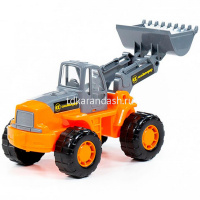 Трактор "Умелец-погрузчик" в сетке, пластик 24x11x11,5см 35400 от магазина "Карандаш"